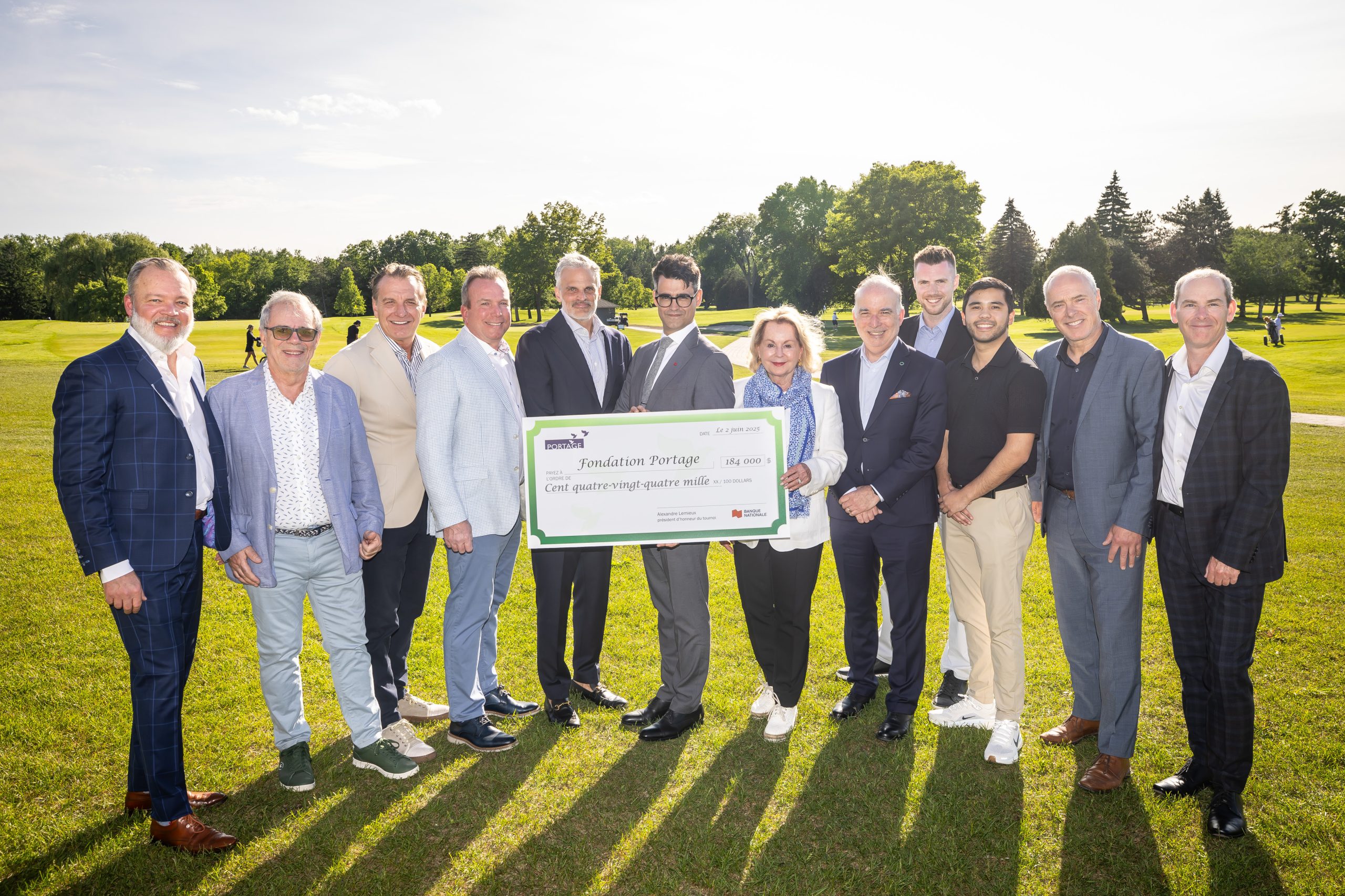 20250602_Portage_0491_Comite_avec_cheque